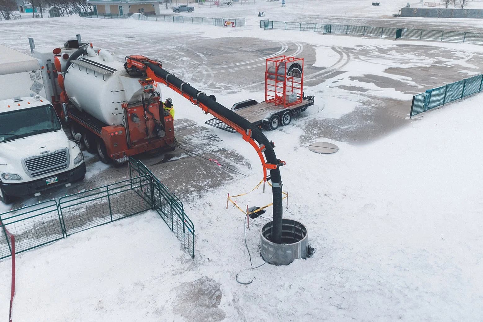 Aerial view of a hydrovac excavation with the EasyDig circular shoring system installed